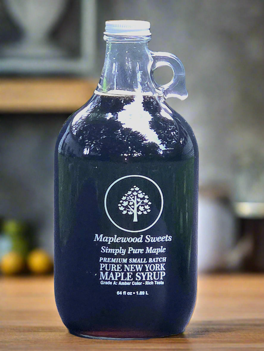 Bottle of Maplewood Sweets maple syrup on a gray background